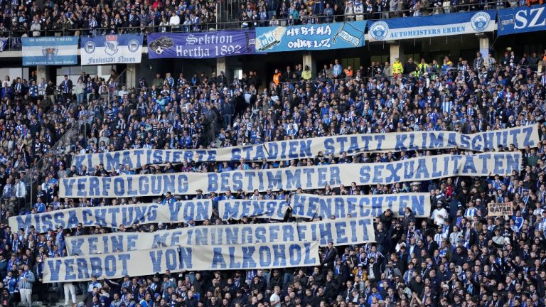 Hertha's supporters hold protest banner during the German Bundesliga soccer match between Hertha BSC Berlin and FC Bayern Munich in Berlin, Germany, Saturday, Nov. 5, 2022 against the Soccer World Cup in Qatar. Slogans read: "Air-conditioned stadiums instead of climate protection, persecution of certain sexualities, disregard of human rights, no freedom of speech, ban on alcohol." (Michael Sohn/AP)