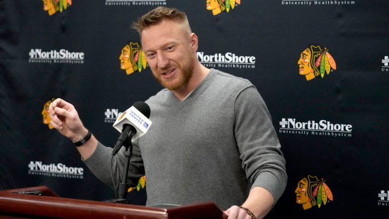 Former Chicago Blackhawks great Marian Hossa responds to a reporter's question before an NHL hockey game between the Blackhawks and the St. Louis Blues. (Charles Rex Arbogast/AP)