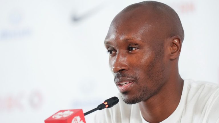 Canada captain Atiba Hutchinson speaks to the media during a press conference at the World Cup in Doha, Qatar during on Thursday, November 24, 2022. (Nathan Denette/The Canadian Press)