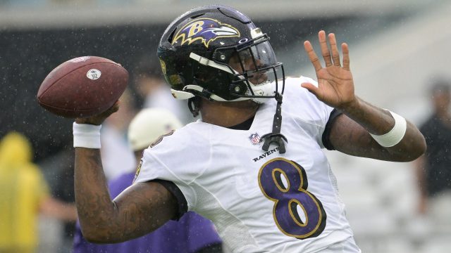 Lamar Jackson at voluntary practice for Ravens after skipping last year's