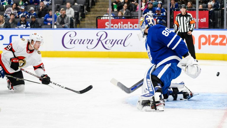 Ottawa Senators left wing Angus Crookshank (59) scores on Toronto Maple Leafs goaltender Keith Petruzzelli (80) during third period NHL pre-season action. (Christopher Katsarov/CP)