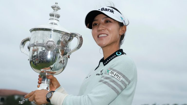 Lydia Ko, of New Zealand, poses with the Rolex Player of the Year trophy after the LPGA CME Group Tour Championship golf tournament, Sunday, Nov. 20, 2022, at the Tiburon Golf Club in Naples, Fla. (Lynne Sladky/AP) 