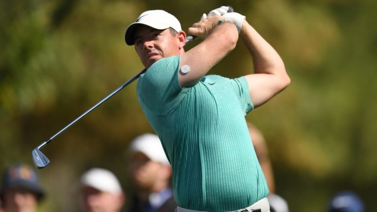 Rory McIlroy of Northern Ireland tees off at the fourth hole during DP World Tour Championship in Dubai, United Arab Emirates, Thursday, Nov. 17, 2022. (Martin Dokoupil/AP)