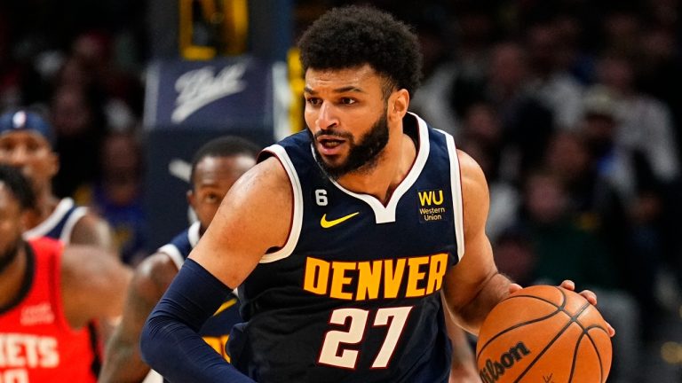 Denver Nuggets guard Jamal Murray brings the ball upcourt against the Houston Rockets during the third quarter of an NBA basketball game. (Jack Dempsey/AP)