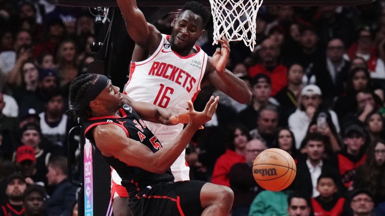 Toronto Raptors forward Precious Achiuwa (5) is stopped by Houston Rockets forward Usman Garuba (16) during second half NBA basketball action in Toronto on Wednesday, November 9, 2022. THE CANADIAN PRESS/Nathan Denette