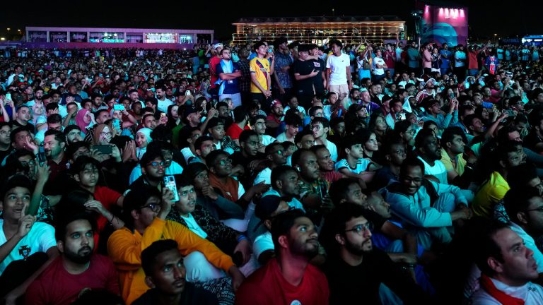 Fans watch the World Cup, group A soccer match between Qatar and Ecuador at the fan zone in Doha, Sunday, Nov. 20, 2022. (Petr David Josek/AP) 