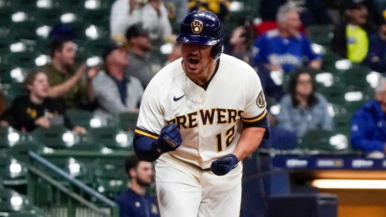 Milwaukee Brewers' Hunter Renfroe reacts after hitting a walk-off single during the 10th inning of a baseball game against the Arizona Diamondbacks Monday, Oct. 3, 2022, in Milwaukee. The Brewers won 6-5. (AP Photo/Morry Gash)