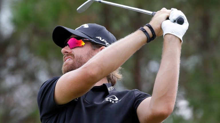 Patrick Rodgers tees off on the ninth hole during the second round of the Houston Open golf tournament Friday, Nov. 11, 2022, in Houston. (Michael Wyke/AP)