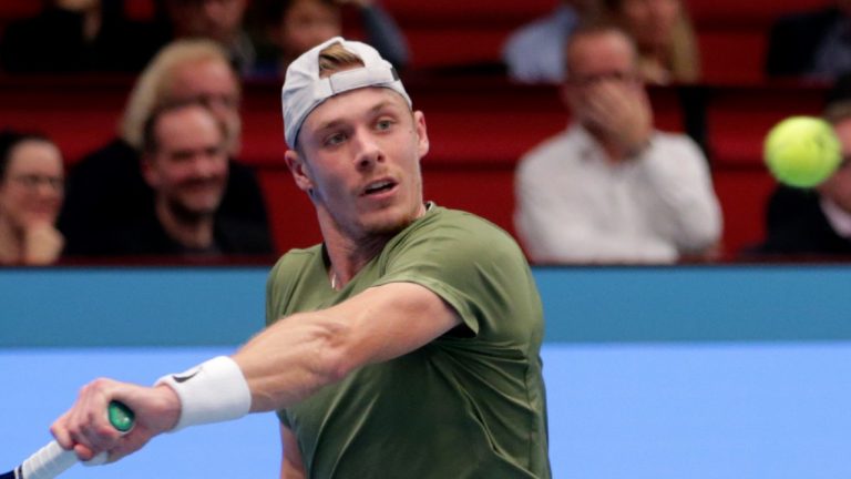 Denis Shapovalov of Canada returns a ball to Daniil Medvedev of Russia during the final match at the Erste Bank Open ATP tennis tournament in Vienna, Austria, Sunday, Oct. 30, 2022. (AP Photo/Heinz-Peter Bader)