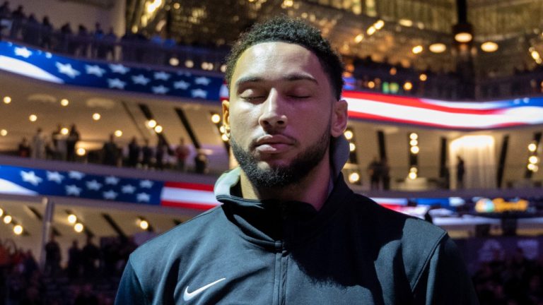 Brooklyn Nets guard Ben Simmons (10) closes his eyes during the national anthem before an NBA basketball game against the Sacramento Kings in Sacramento, Calif., Tuesday, Nov. 15, 2022. (AP Photo/JosÃ© Luis Villegas)