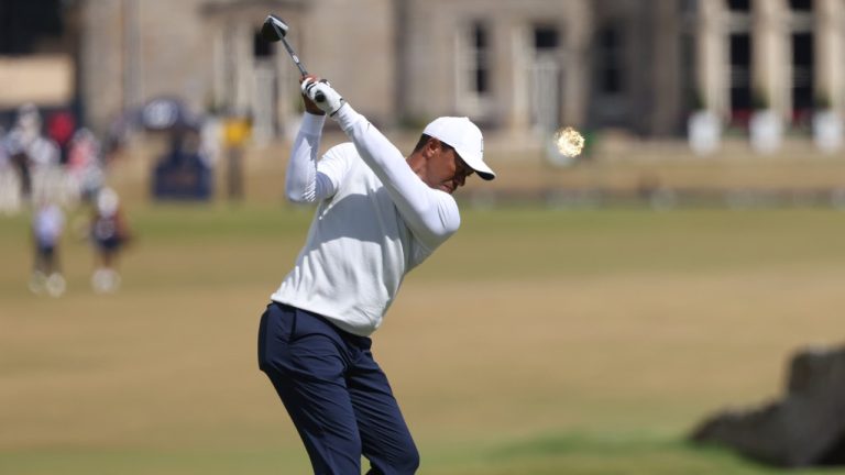 Tiger Woods of the US plays from the 18th tee during the second round of the British Open golf championship on the Old Course at St. Andrews, Scotland, Friday July 15, 2022. The Open Championship returns to the home of golf on July 14-17, 2022, to celebrate the 150th edition of the sport's oldest championship, which dates to 1860 and was first played at St. Andrews in 1873. (AP Photo/Peter Morrison)