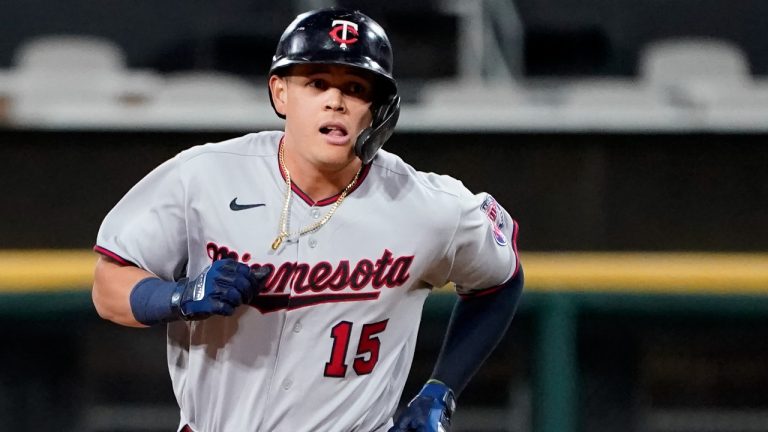 Minnesota Twins' Gio Urshela rounds second after hitting a two-run home run off Chicago White Sox starting pitcher Johnny Cueto during the first inning of a baseball game Monday, Oct. 3, 2022, in Chicago. (Charles Rex Arbogast/AP)