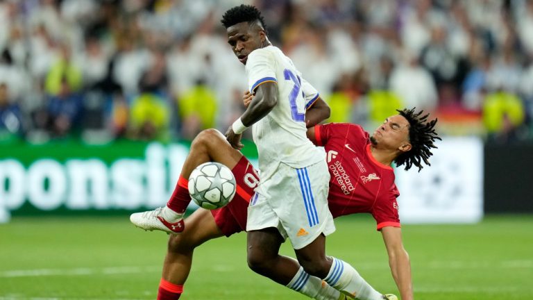 Liverpool's Trent Alexander-Arnold fights for the ball with Real Madrid's Vinicius Junior, left, during the Champions League final soccer match between Liverpool and Real Madrid at the Stade de France in Saint Denis near Paris, Saturday, May 28, 2022. (Manu Fernandez/AP)