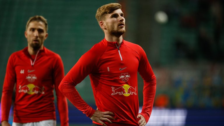 Leipzig's Timo Werner, right, hands on the pitch prior to the start of the Champions League group F soccer match between Shakhtar Donetsk and Leipzig at Polish Army Stadium stadium in Warsaw, Wednesday, Nov. 2, 2022. (Michal Dyjuk/AP)