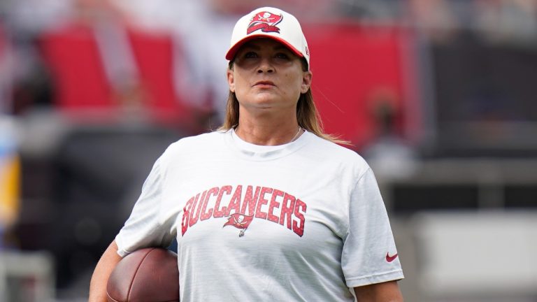 Tampa Bay Buccaneers assistant defensive line coach Lori Locust during an NFL football game against the Green Bay Packers on Sept. 25, 2022, in Tampa, Fla. An annual diversity study has found the NFL posted significant gains in hiring women for positions in coaching, front offices and league headquarters. (AP Photo/Chris O'Meara, File)