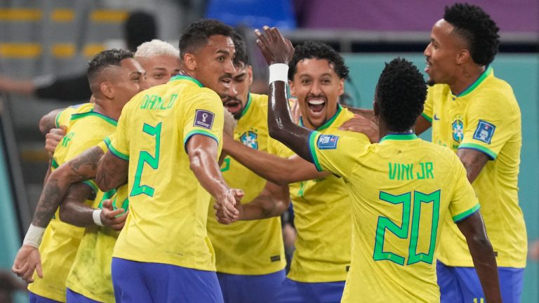 Brazil players celebrate after Neymar scored his side's second goal with a penalty kick during the World Cup round of 16 soccer match between Brazil and South Korea at the Stadium 974 in Doha, Qatar, Monday, Dec. 5, 2022. (Jin-Man Lee/AP)