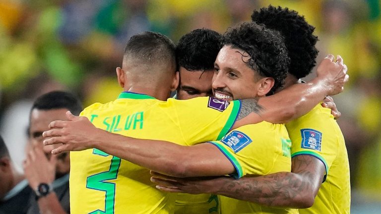 Brazil players celebrate after winning the World Cup group G soccer match between Brazil and Switzerland, at the Stadium 974 in Doha, Qatar, Monday, Nov. 28, 2022. (Natacha Pisarenko/AP)