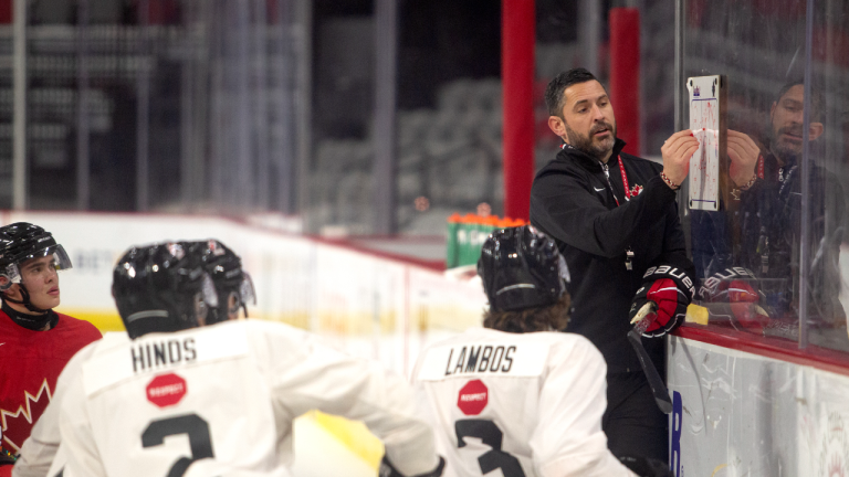 Team Canada World Junior Head Coach Dennis Williams goes over a drill with players during the Canadian World Junior Hockey Championships selection camp in Moncton, N.B., Friday, December 9, 2022. (CP)