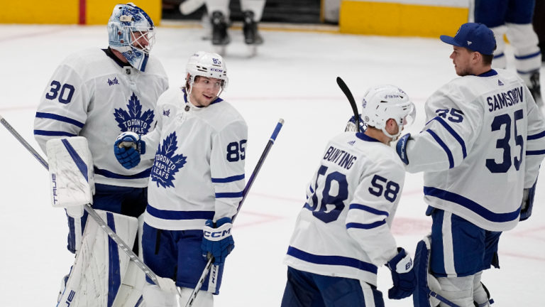 Toronto Maple Leafs' Matt Murray (30), Semyon Der-Arguchintsev (85), Michael Bunting (58) and Ilya Samsonov (35) celebrate after their 4-0 win in an NHL hockey game against the Dallas Stars, Tuesday, Dec. 6, 2022, in Dallas. (AP)