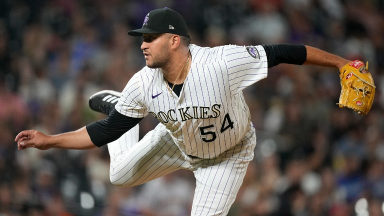 Colorado Rockies relief pitcher Carlos Estevez works against the San Francisco Giants during the eighth inning of a baseball game Friday, Aug. 19, 2022, in Denver. (David Zalubowski/AP)