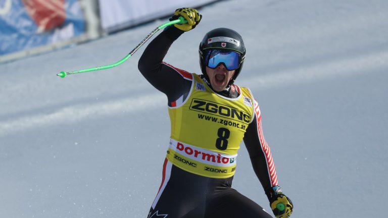 Canada's James Crawford celebrates after completing an alpine ski, men's World Cup downhill race, in Bormio, Italy, Wednesday, Dec.28, 2022. (Alessandro Trovati/AP Photo)