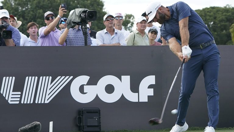 Dustin Johnson hits from the third tee during the second round of the LIV Golf Team Championship at Trump National Doral Golf Club, Saturday, Oct. 29, 2022, in Doral, Fla. (Lynne Sladky/AP)