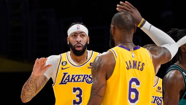 Los Angeles Lakers forward Anthony Davis, left, is congratulated by forward LeBron James after scoring during the second half of an NBA basketball game against the Portland Trail Blazers Wednesday, Nov. 30, 2022, in Los Angeles. (Mark J. Terrill/AP Photo)