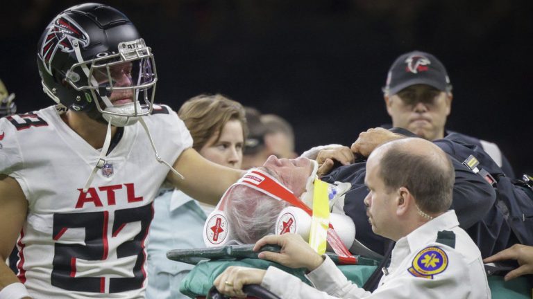 Atlanta Falcons defensive coordinator Dean Pees is carted off the field shortly before Sunday's game against the New Orleans Saints in New Orleans, Sunday, Dec.18, 2022. (Brett Duke/The Times-Picayune/The New Orleans Advocate via AP)