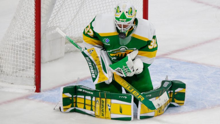 Minnesota Wild goaltender Filip Gustavsson makes a stop during the third period of the team's NHL hockey game. (Andy Clayton-King/AP)