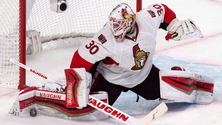 Ottawa Senators goalie Andrew Hammond makes a kick save as they face the Montreal Canadiens during second period of Game 2 NHL Stanley Cup first round playoff hockey action in Montreal on April 17, 2015. (Paul Chiasson/CP)