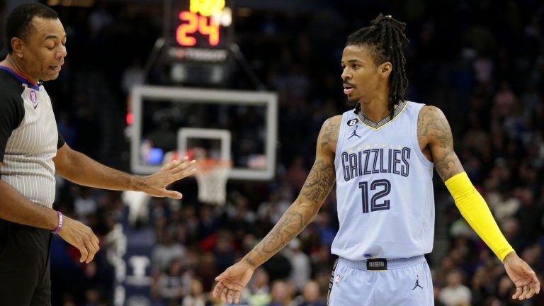 Memphis Grizzlies guard Ja Morant (12) argues with referee Karl Lane during the fourth quarter of the team's NBA basketball game against the Minnesota Timberwolves on Wednesday, Nov. 30, 2022, in Minneapolis. (Andy Clayton-King/AP)