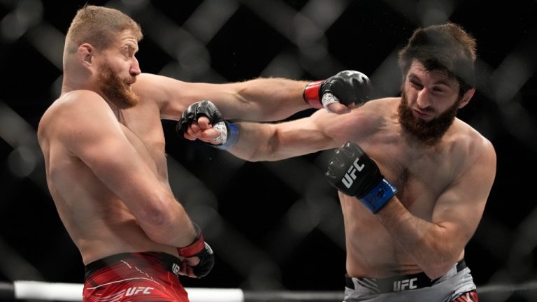 Jan Blachowicz, left, fights Magomed Ankalaev during a UFC 282 mixed martial arts light heavyweight title bout Saturday, Dec. 10, 2022, in Las Vegas. (John Locher/AP)