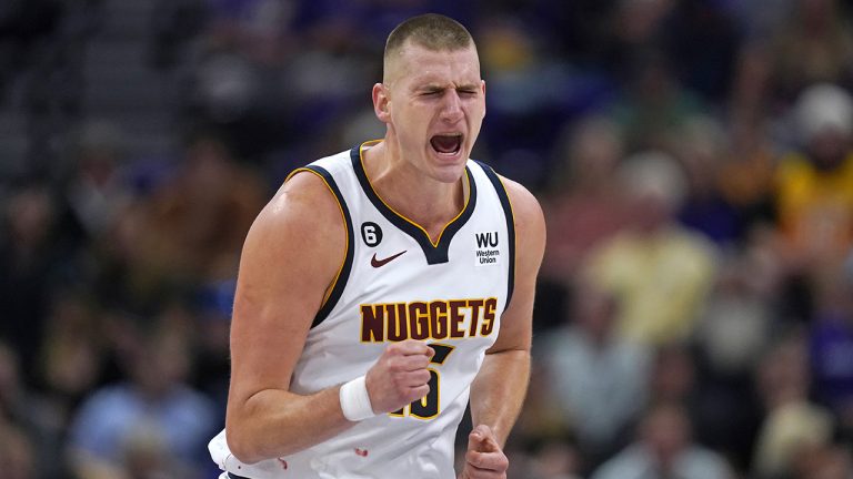 Denver Nuggets centre Nikola Jokic reacts after scoring against the Utah Jazz during the second half of an NBA basketball game Wednesday, Oct. 19, 2022, in Salt Lake City. (Rick Bowmer/AP)