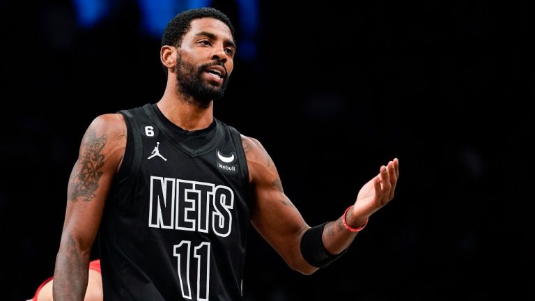 Brooklyn Nets guard Kyrie Irving gestures during the first half of the team's NBA basketball game against the Toronto Raptors on Friday, Dec. 2, 2022, in New York. (Eduardo Munoz Alvarez/AP Photo)