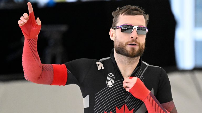 Laurent Dubreuil of Levis Que. reacts to his gold medal in the men's 1000m event at the Four Continents speedskating championships, Sunday, December 4, 2022 in Quebec City. (Jacques Boissinot/CP)