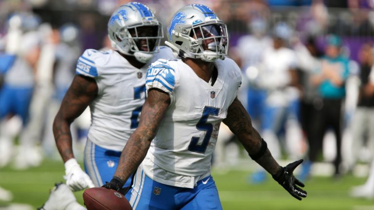 Detroit Lions safety DeShon Elliott (5) celebrates after recovering a fumble during the second half of an NFL football game against the Minnesota Vikings, Sunday, Sept. 25, 2022, in Minneapolis. (Andy Clayton-King/AP)