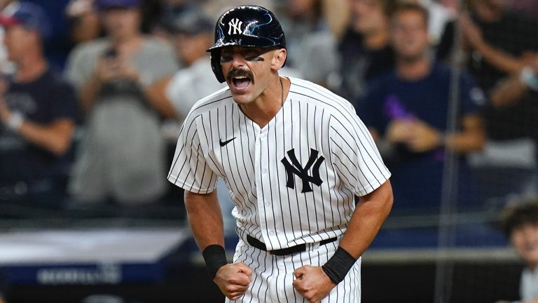 Former New York Yankees infielder Matt Carpenter celebrates after scoring on a two-run home run by Gleyber Torres during the eighth inning of the team's baseball game against the Cincinnati Reds on Thursday, July 14, 2022, in New York. (Frank Franklin II/AP)