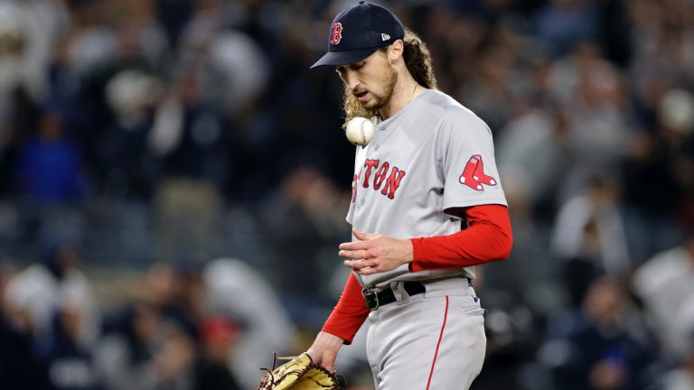 Boston Red Sox pitcher Matt Strahm reacts after giving up the winning RBI-single to the New York Yankees. (Adam Hunger/AP)