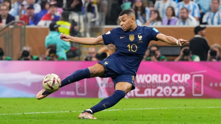 France's Kylian Mbappe scores his side's second goal during the World Cup final soccer match between Argentina and France at the Lusail Stadium in Lusail, Qatar, Sunday, Dec.18, 2022. (Manu Fernandez/AP)