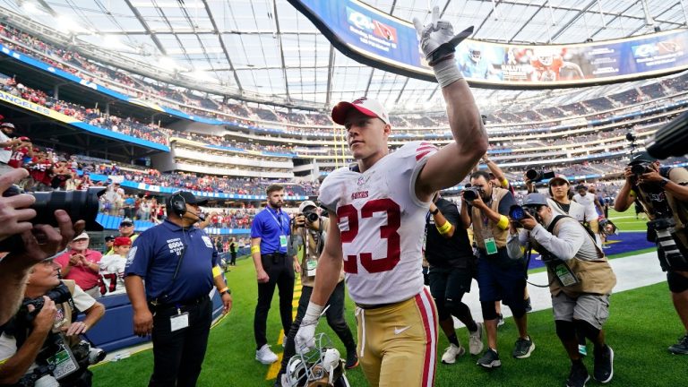 San Francisco 49ers running back Christian McCaffrey waves to fans as he walks off the field after the 49ers defeated the Los Angeles Rams 31-14 in an NFL football game Sunday, Oct. 30, 2022, in Inglewood, Calif. (Ashley Landis/AP Photo)