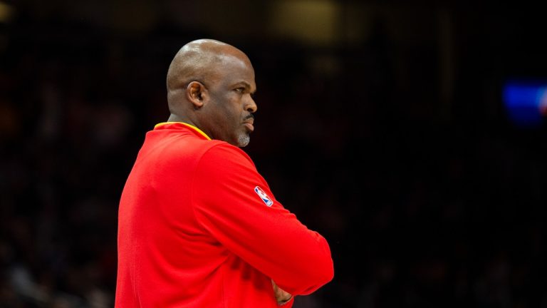 Atlanta Hawks head coach Nate McMillan watches the game from court side during the first half of an NBA basketball game against the Chicago Bulls, Wednesday, Dec. 21, 2022, in Atlanta. (Hakim Wright Sr./AP Photo)