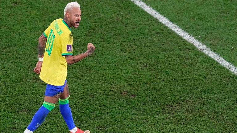 Brazil's Neymar celebrates after scoring his side's opening goal during the World Cup quarterfinal soccer match between Croatia and Brazil, at the Education City Stadium in Al Rayyan, Qatar, Friday, Dec. 9, 2022. (Pavel Golovkin/AP Photo)