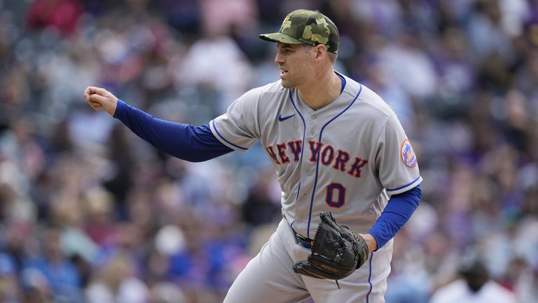 Adam Ottavino and the New York Mets finalized a $4.5 million, one-year contract Tuesday that keeps the veteran reliever with his hometown team. (David Zalubowski/AP)