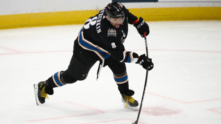 Washington Capitals left wing Alex Ovechkin (8) shoots during the second period of an NHL hockey game against the Winnipeg Jets, Friday, Dec. 23, 2022, in Washington. (Nick Wass/AP)