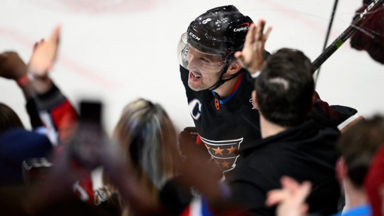 Washington Capitals left wing Alex Ovechkin (8) celebrates his goal during the first period of an NHL hockey game against the Winnipeg Jets, Friday, Dec. 23, 2022, in Washington. This was Ovechkin's 801st NHL goal. (AP Photo/Nick Wass)