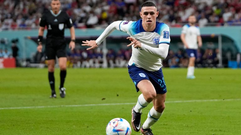 England's Phil Foden controls the ball during the World Cup group B soccer match between England and Wales, at the Ahmad Bin Ali Stadium in Al Rayyan, Qatar, Tuesday, Nov. 29, 2022. (Thanassis Stavrakis/AP)