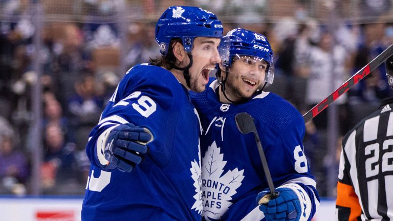 Toronto Maple Leafs forward Semyon Der-Arguchintsev (85) celebrates his goal against the Montreal Canadiens with teammate Kurtis Gabriel (29) during second period NHL pre-season hockey action in Toronto on Tuesday, October 5, 2021. (Evan Buhler/CP)