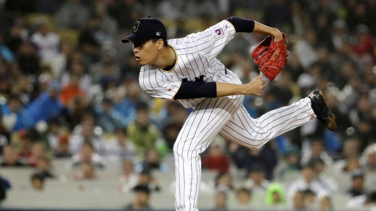 Japan's Kodai Senga throws during the seventh inning of a semifinal in the World Baseball Classic against the United States, in Los Angeles, Tuesday, March 21, 2017. (Chris Carlson/AP)