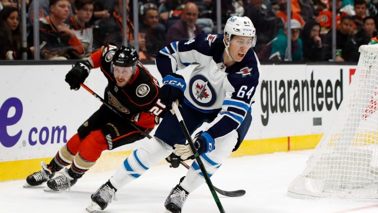 Winnipeg Jets defenceman Logan Stanley, right. (Alex Gallardo/AP)