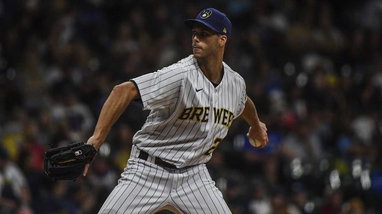 Former Milwaukee Brewers lefty Taylor Rogers pitches during the eighth inning of a baseball game against the Cincinnati Reds, Sunday, Sept. 11, 2022, in Milwaukee. (Kenny Yoo/AP)